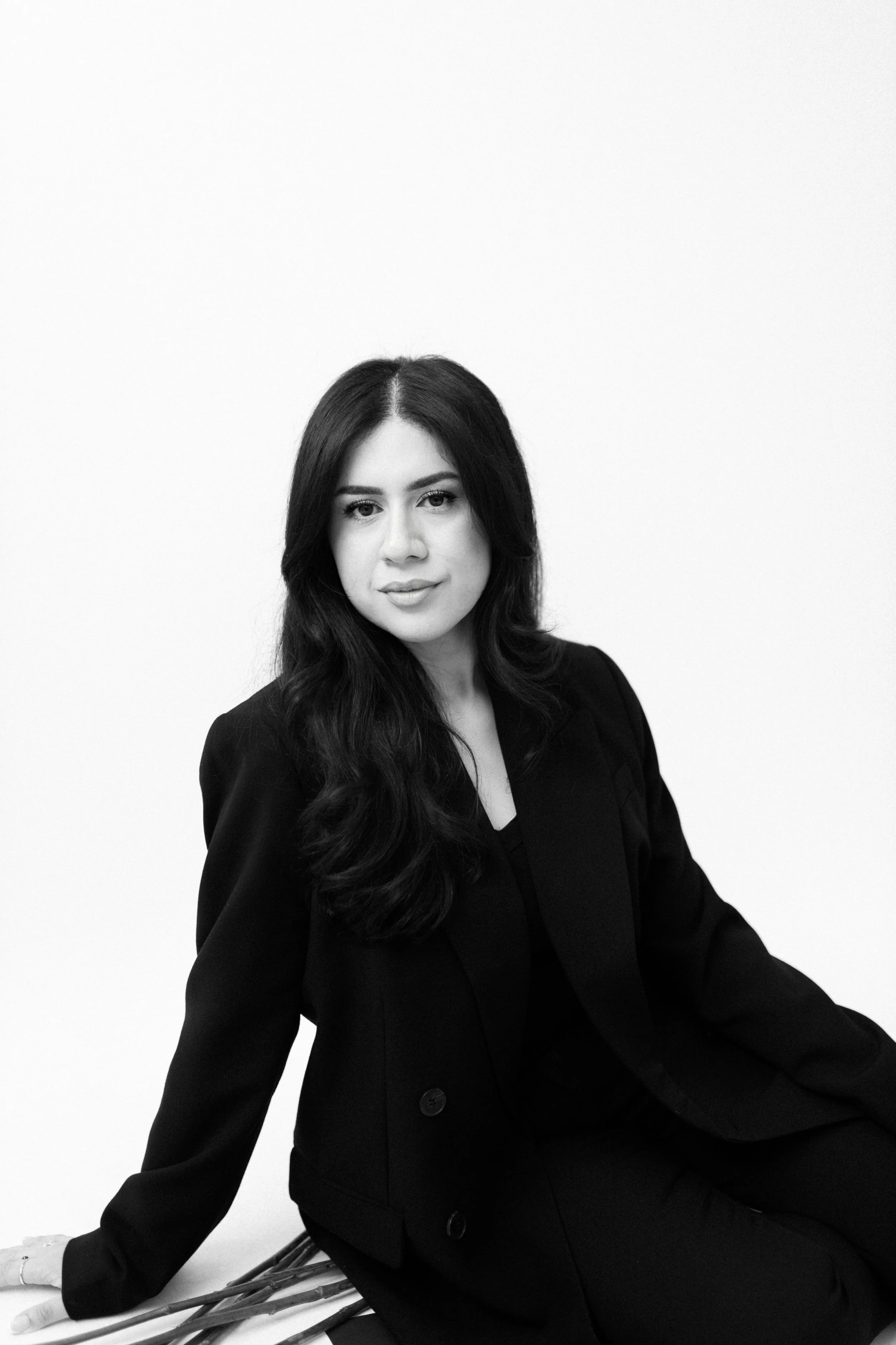 Black-and-white portrait of The Camarena Edit wedding and event content creator
