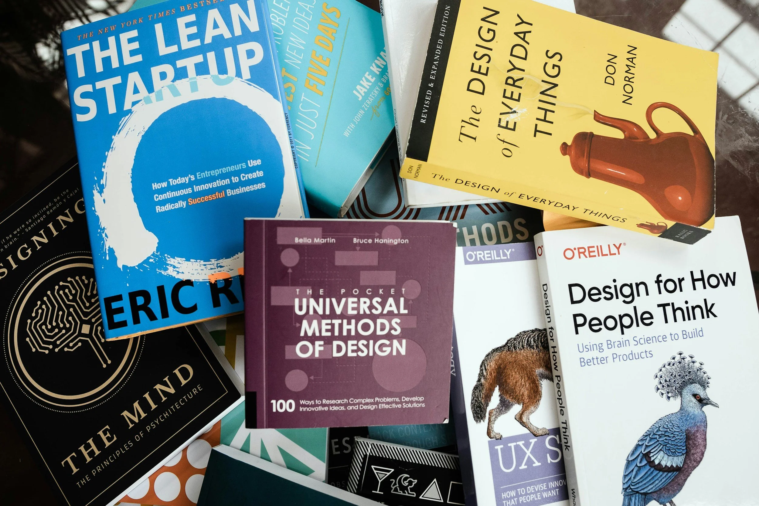 Pile of UX design books