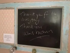 Black chalkboard with handwritten message thanking for loyalty and support