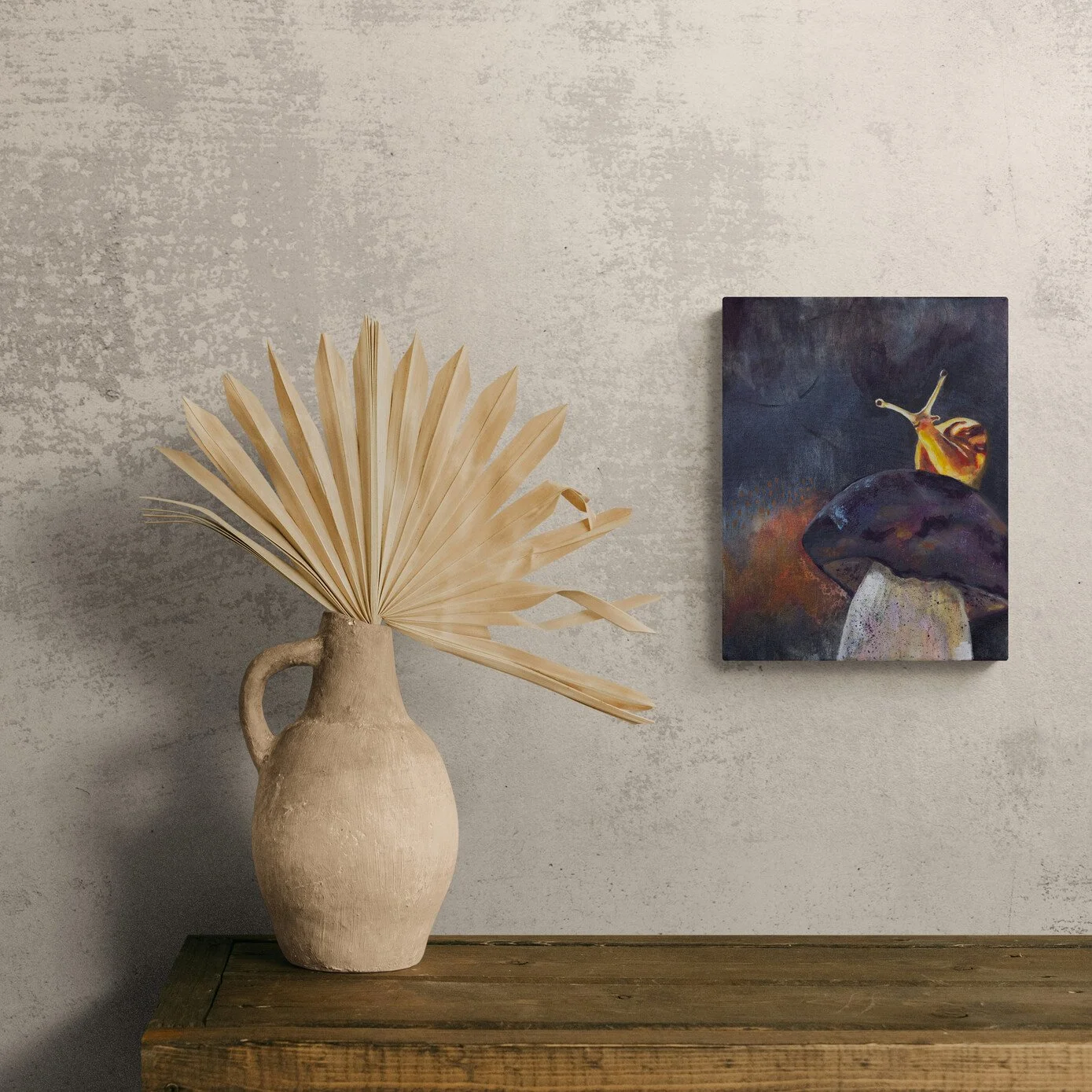 cabinet-with-a-dried-palm-frond-in-a-clay-vase.jpg