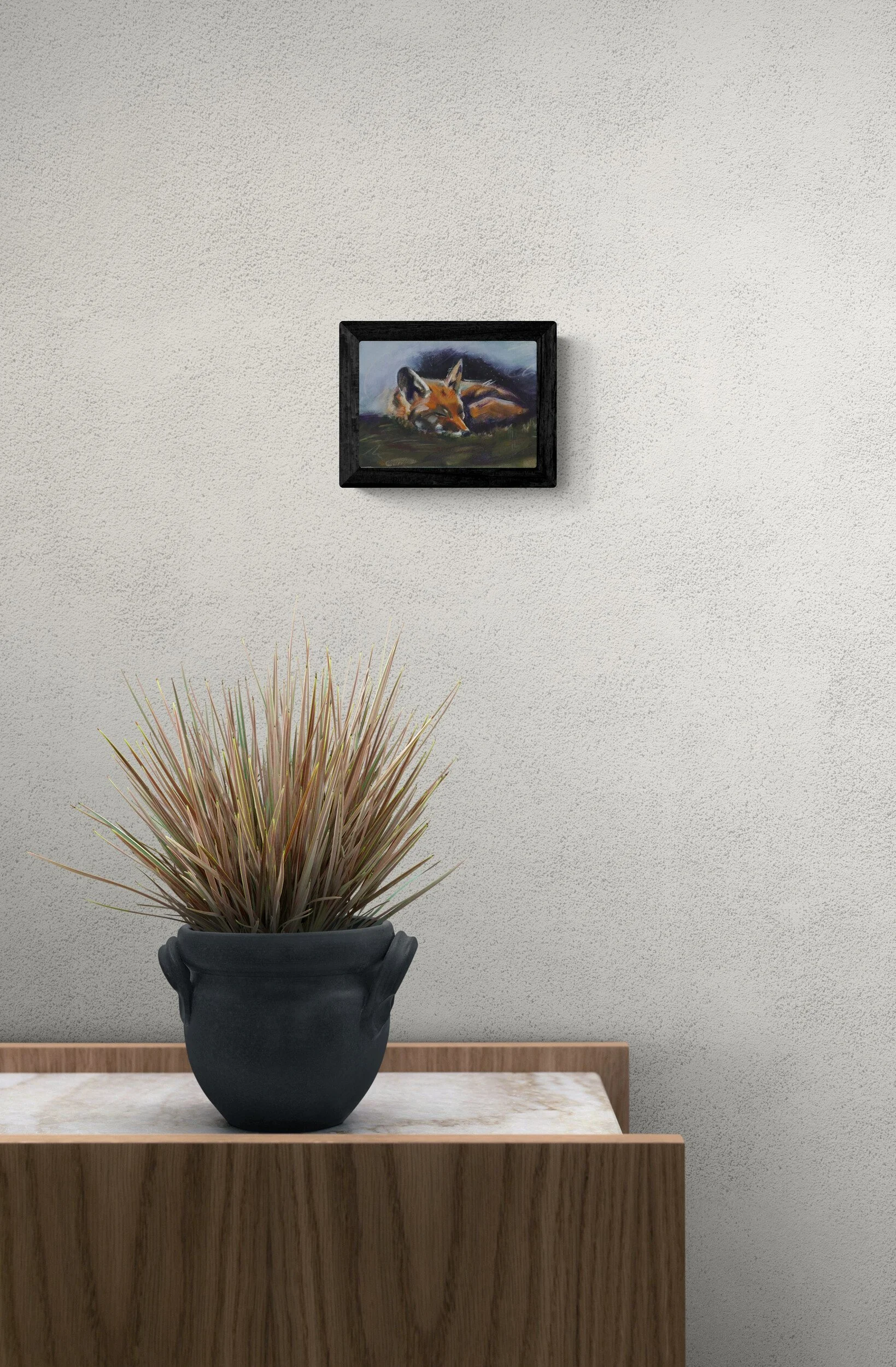 close-up-of-a-small-plant-sitting-on-a-cabinet.jpg