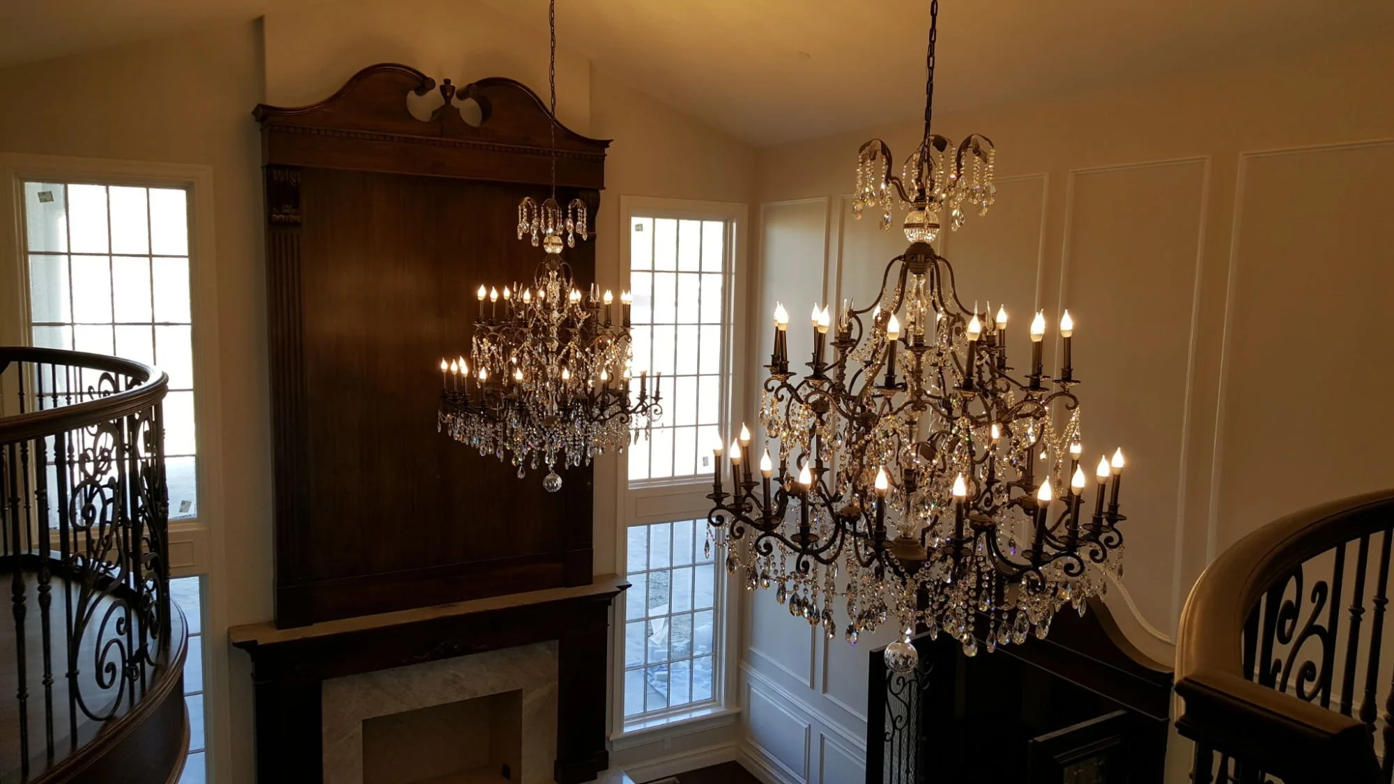 Large decorative chandelier installed in a custom home