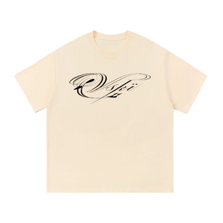 Cream-colored T-shirt with black cursive script that reads 'VSKI' on the front.