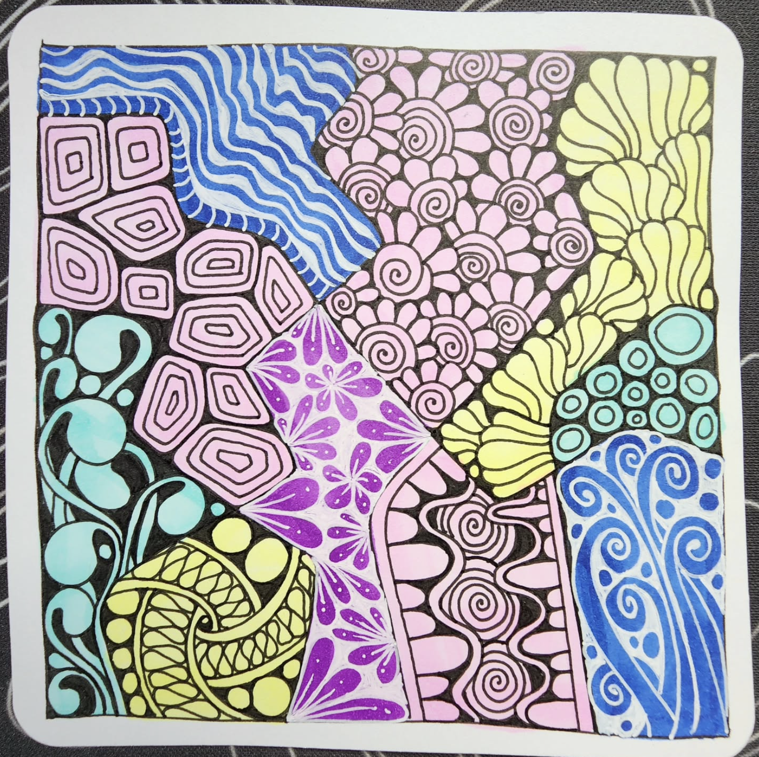 Colorful abstract doodle art with various patterns, including spirals, flowers, waves, and geometric shapes, divided into sections with different pastel and vibrant colors.