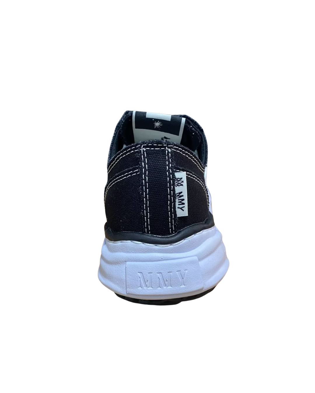 Rear heel view of the AMIRI x MMY Bones sneaker showing the black upper and light blue sole