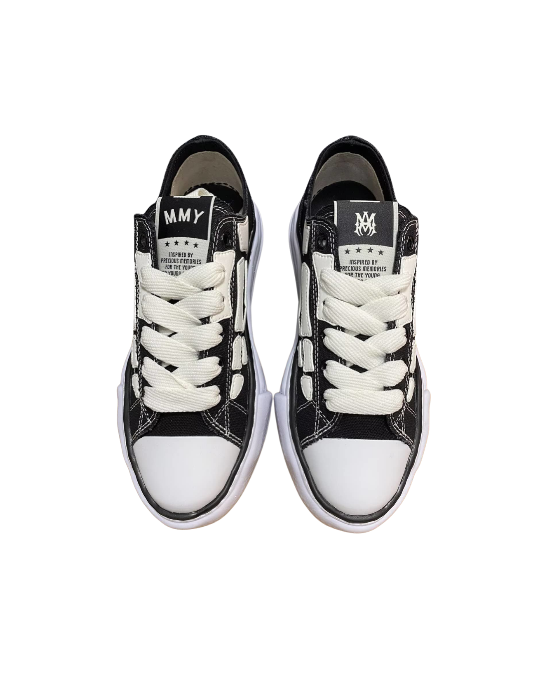 Top-down view of a pair of AMIRI x MMY Bones sneakers in black with cream detailing