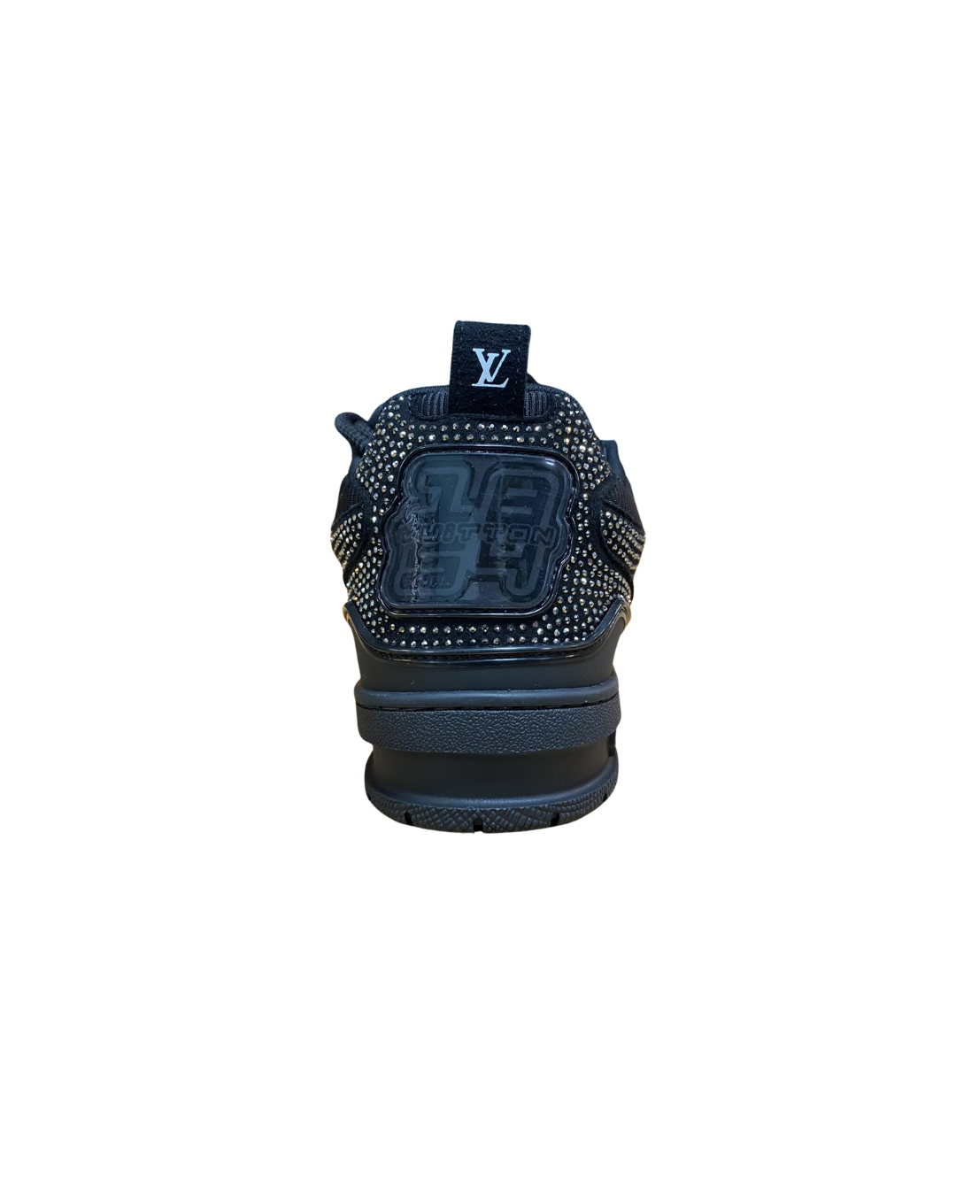 Rear view of the grey studded Louis Vuitton LV Skate sneaker showing the heel pull tab