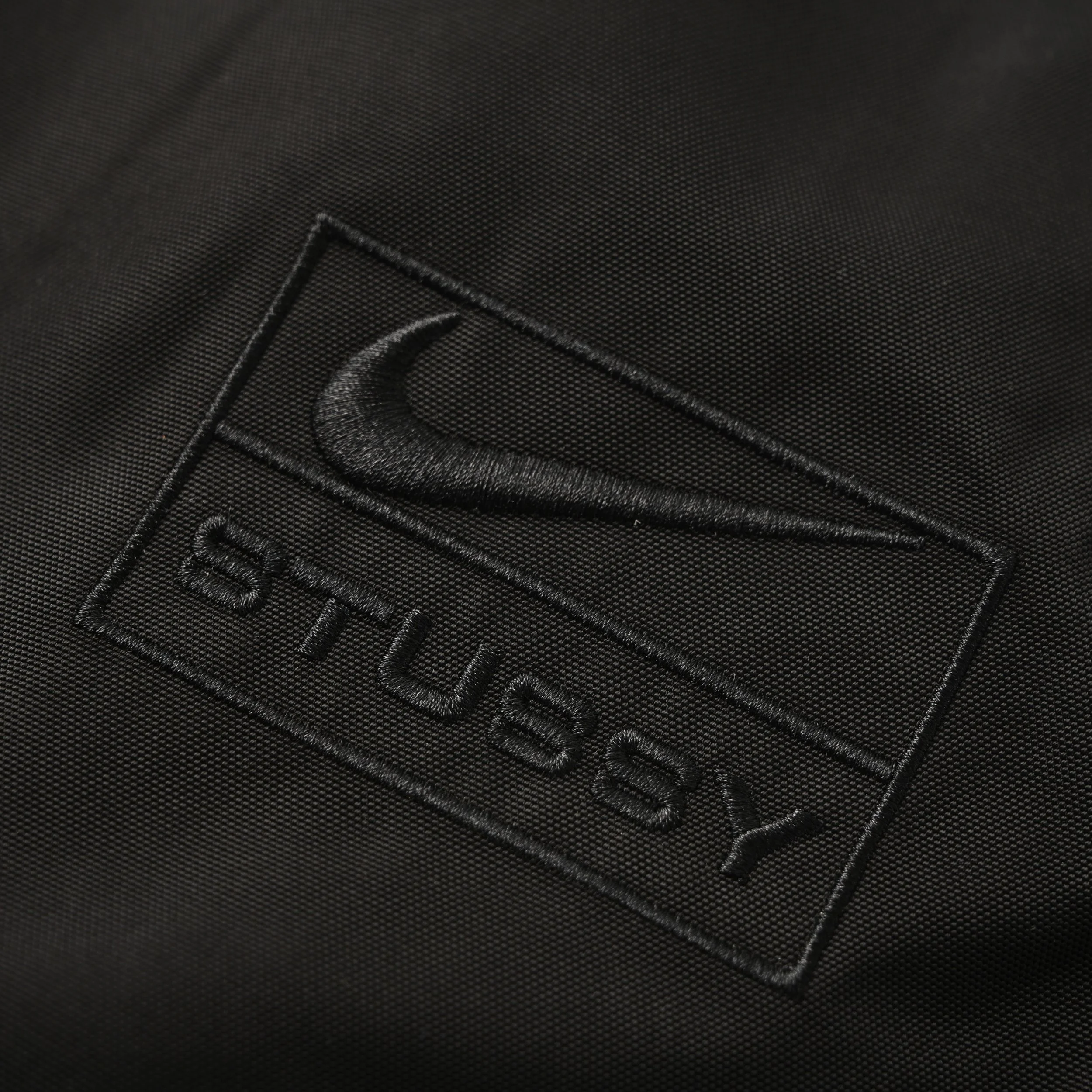 Nike x Stüssy Utility Pants Obsidian – Water-Repellent Cargo Pants Patch Close Up