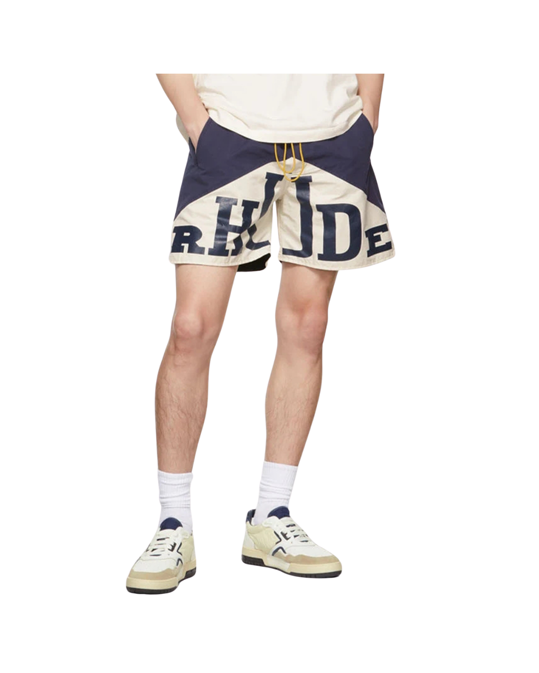 Model wearing the navy and cream Rhude Cupro yachting shorts with white sneakers