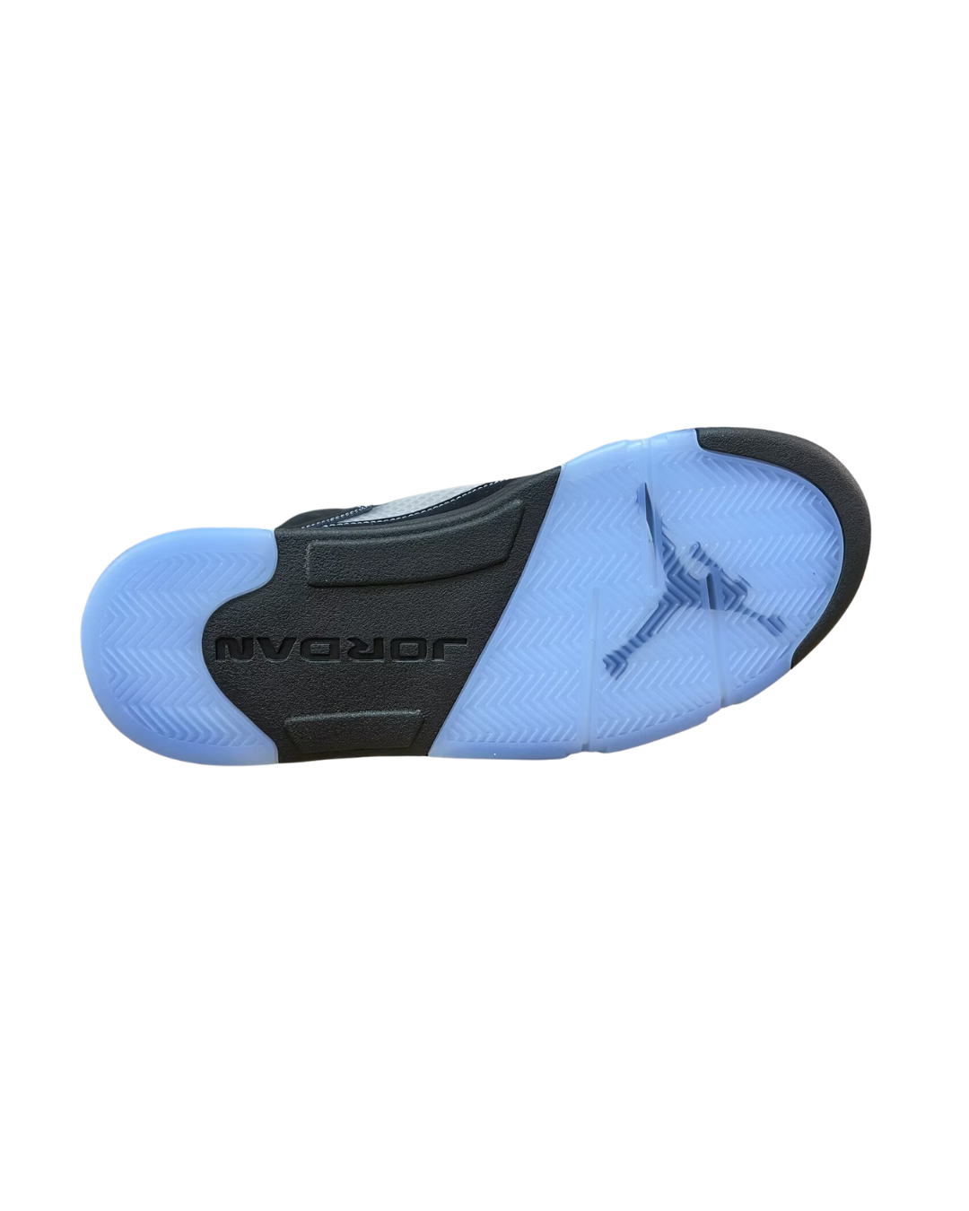Outsole view of the Air Jordan 5 Black University Blue showing the blue and black translucent sole