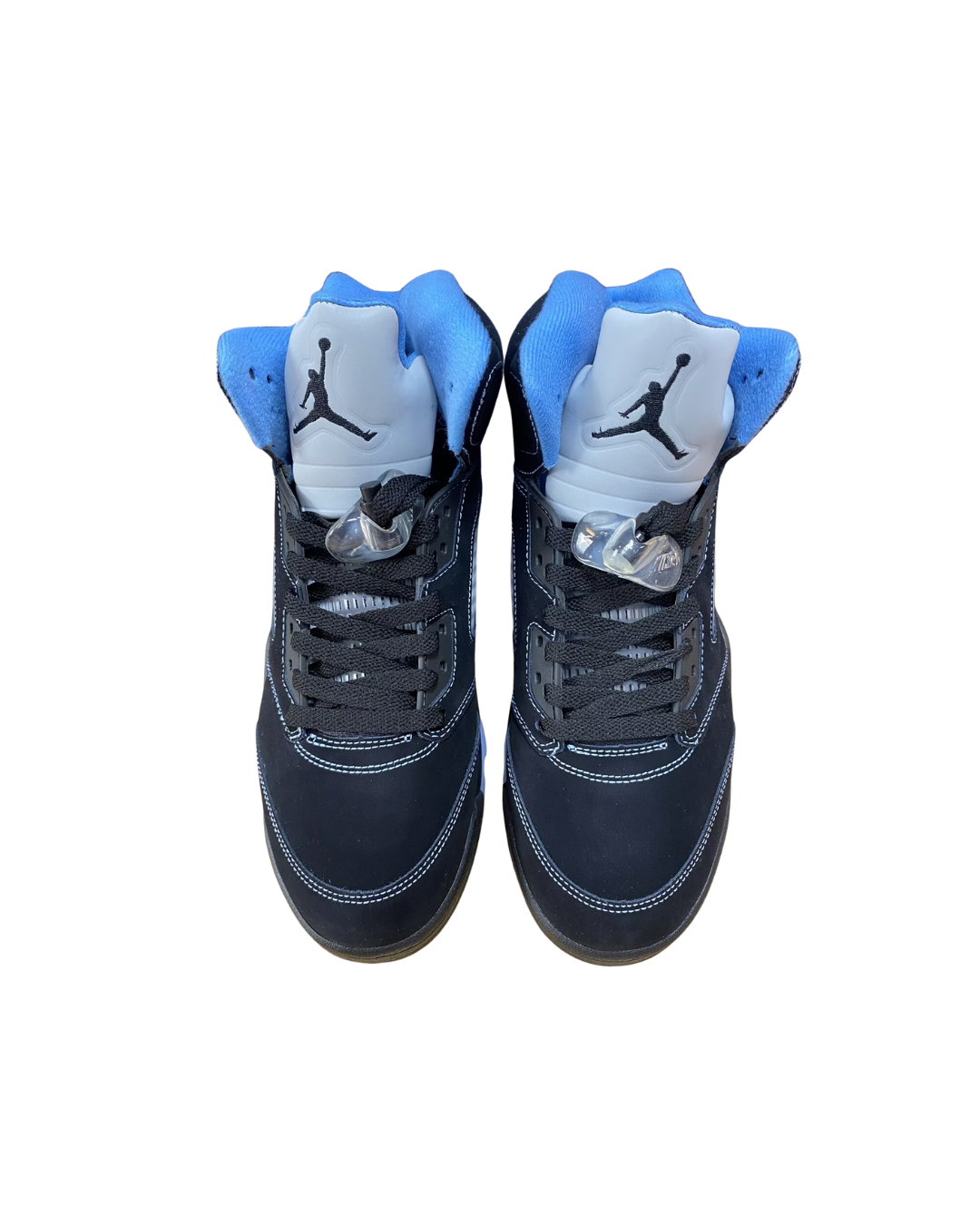 Top-down view of a pair of Air Jordan 5 Black University Blue sneakers