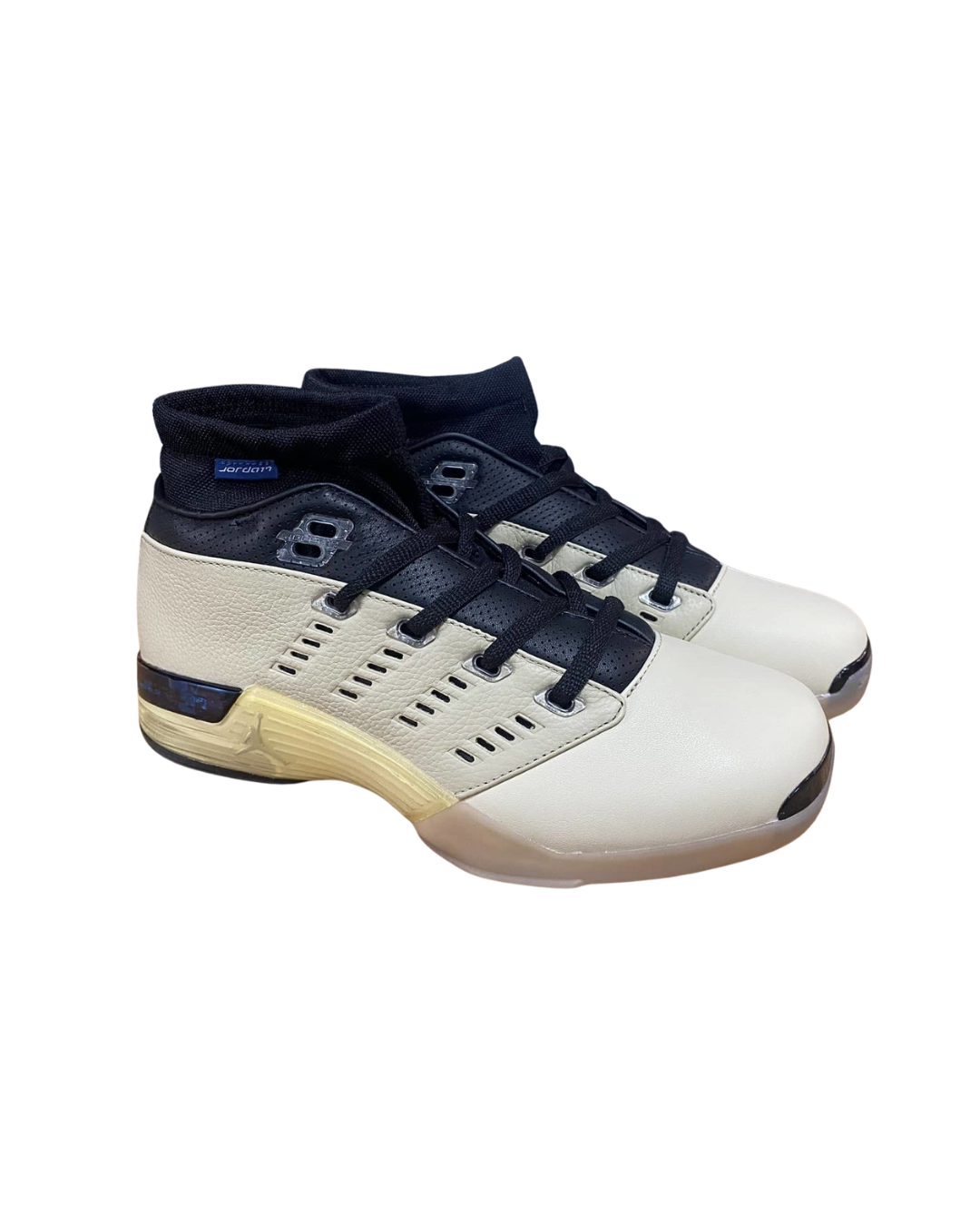 Angled three-quarter view of the Infinite Archives x Air Jordan 17 Low SP Beach sneaker in navy and cream