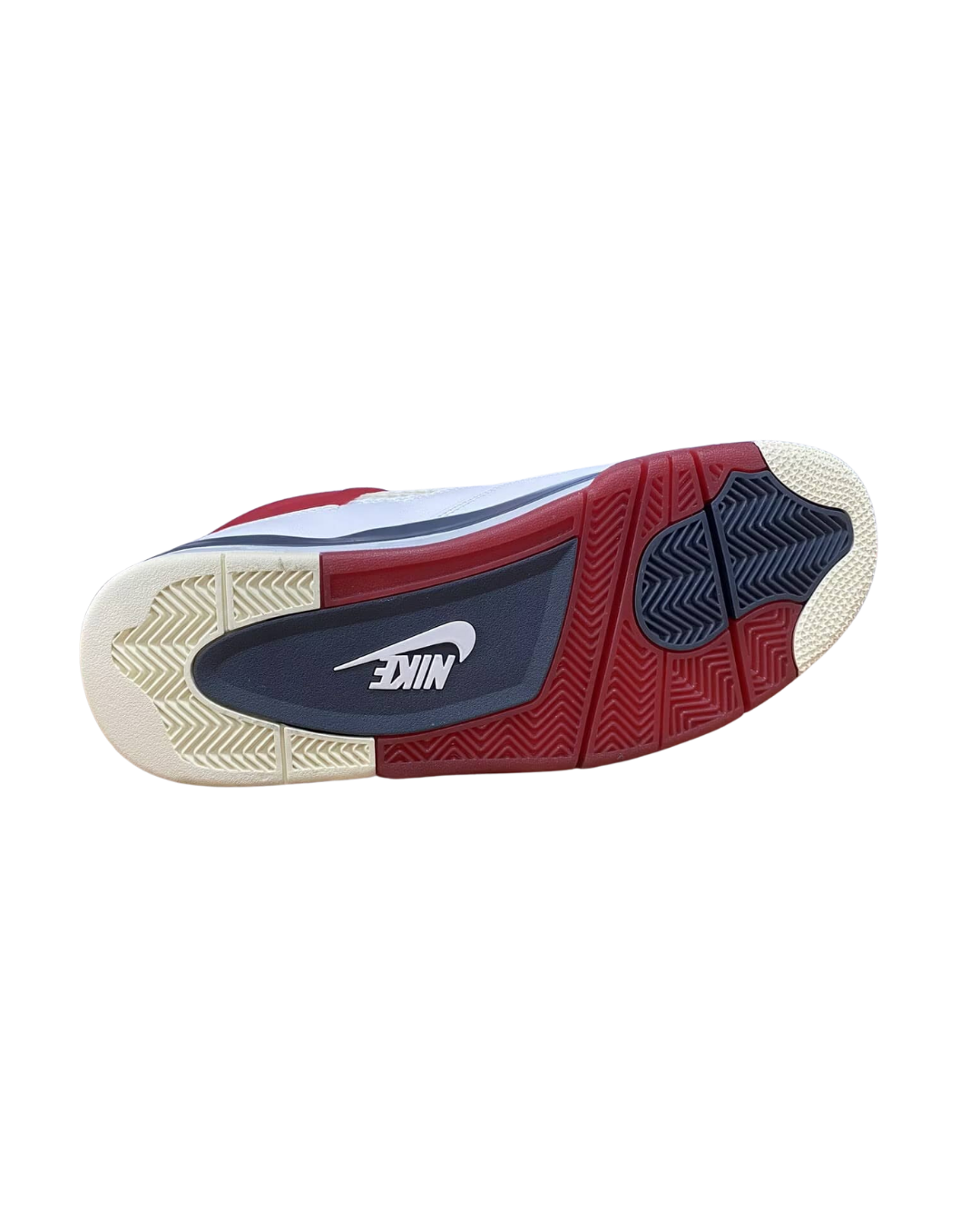 Outsole view of the Nigel Sylvester Air Jordan 4 showing the brick-pattern sole with a 250 detail