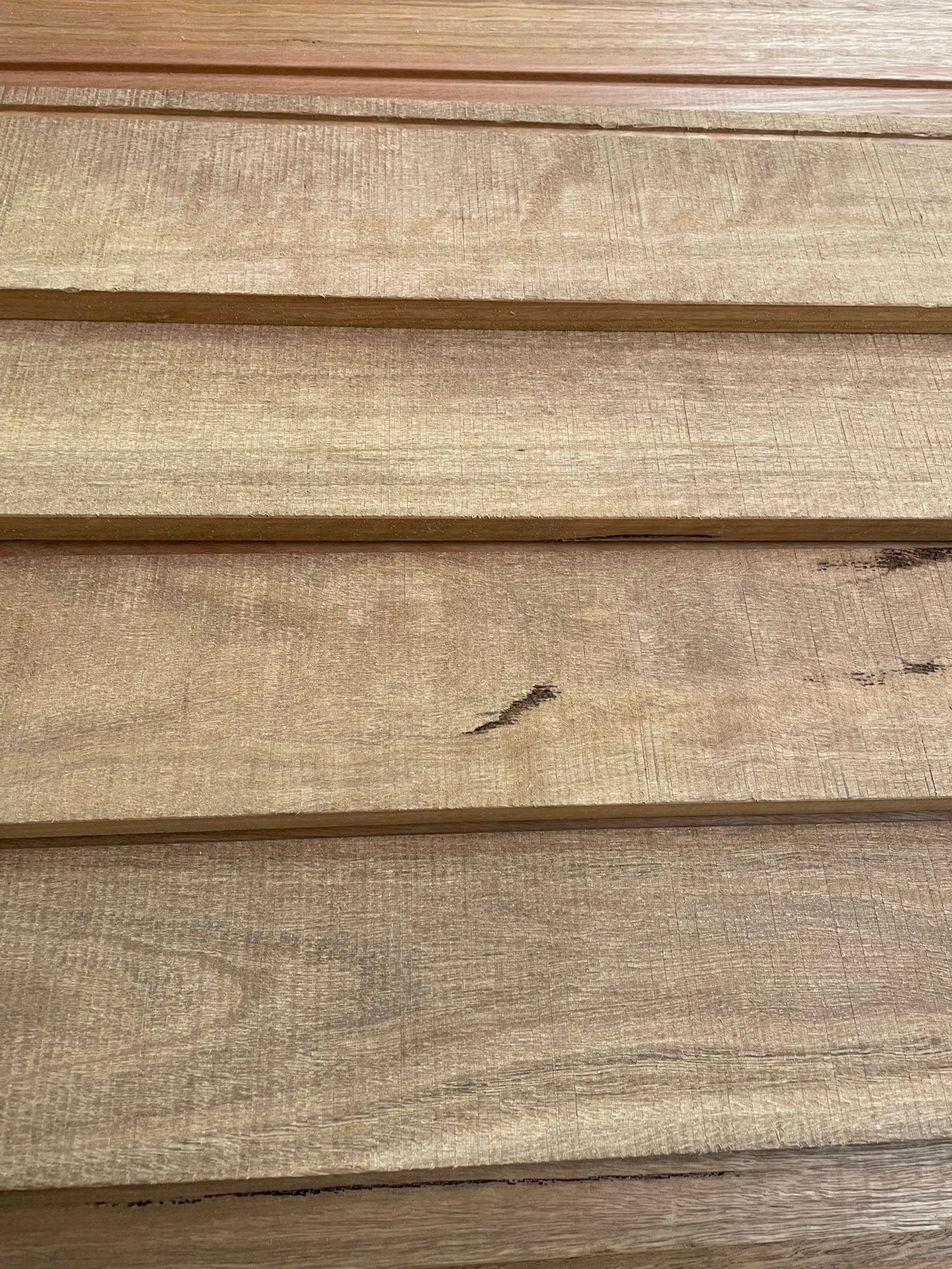 Spotted Gum bevel back cladding with a new band-sawn face, uncoated