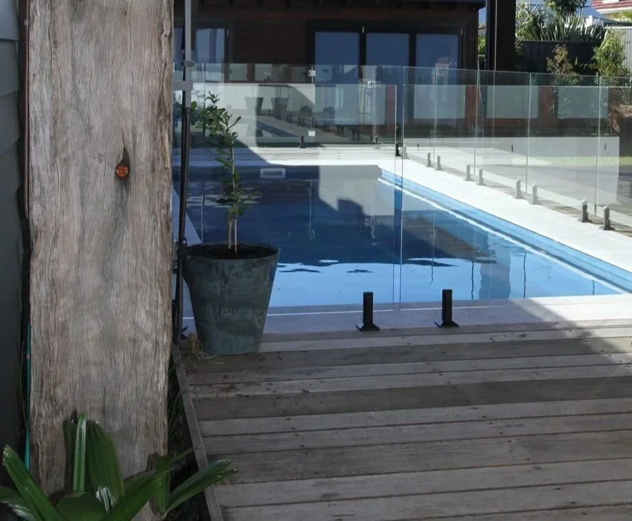 Spotted Gum hardwood decking beside a residential swimming pool.