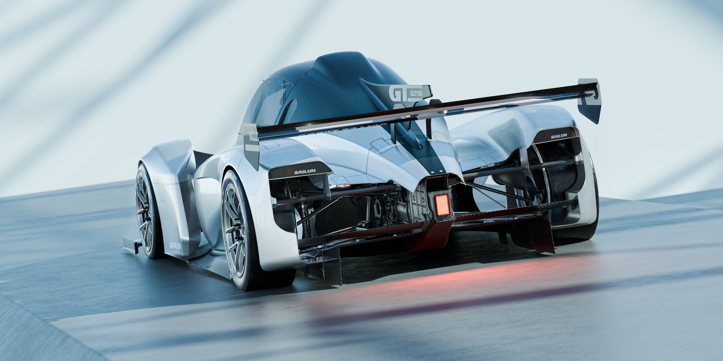 A futuristic white and black race car on an icy surface with a sleek design and aerodynamic features.
