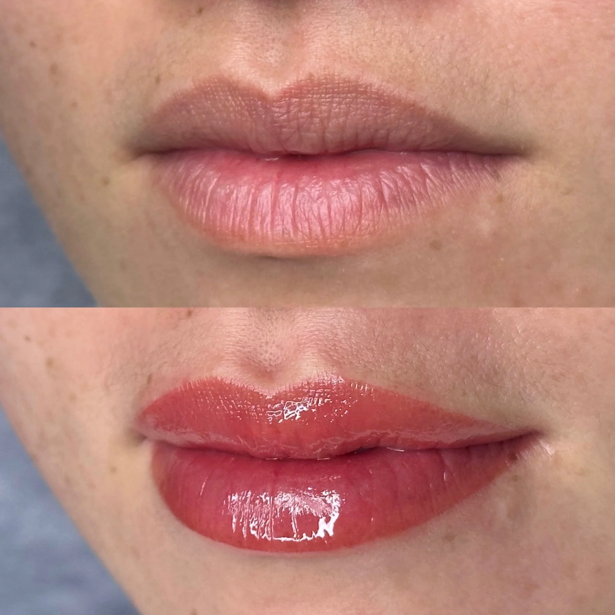 Close-up of a person's lips with glossy red lipstick.