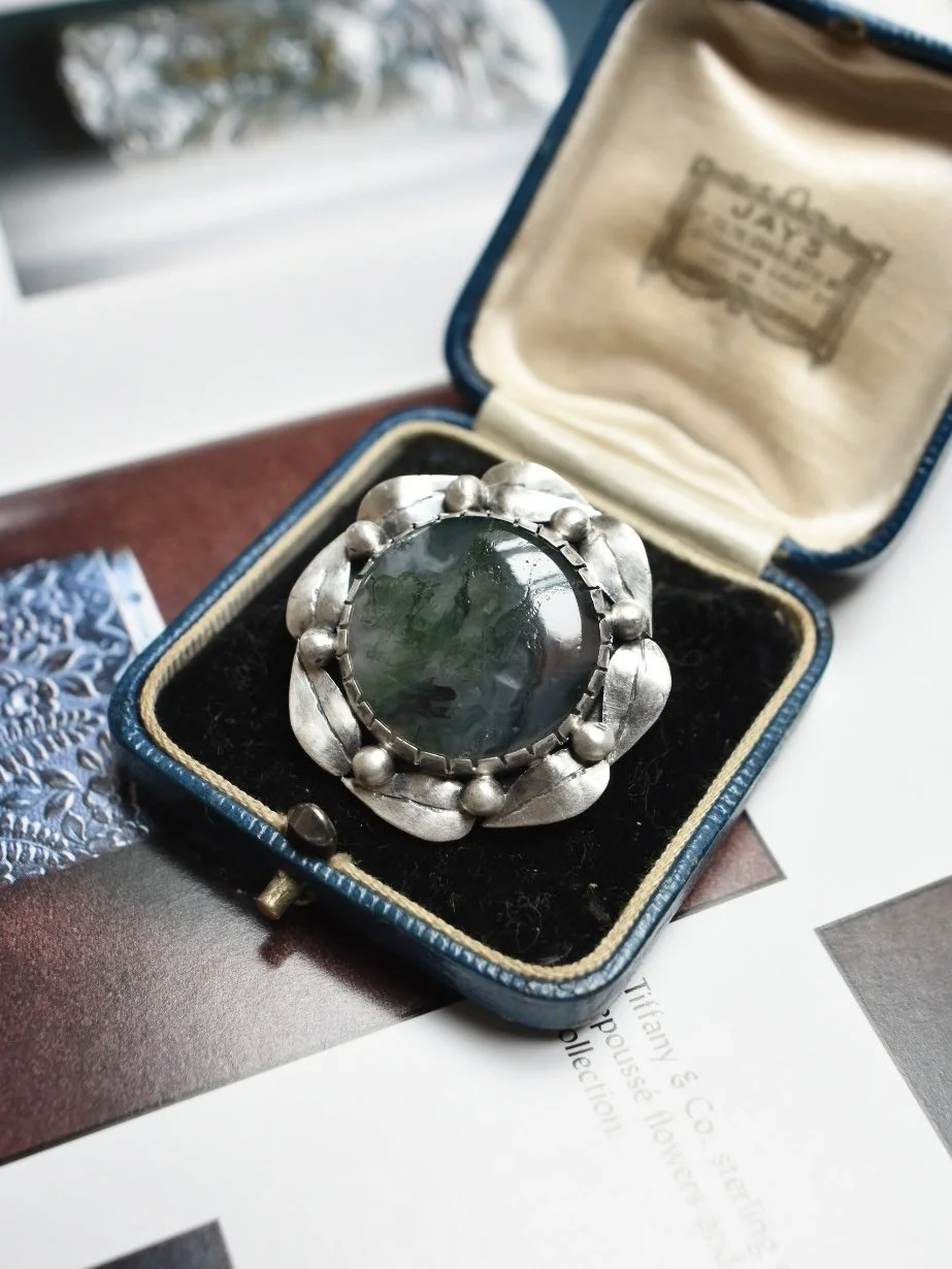 Arts and Crafts era moss agate sterling silver antique brooch