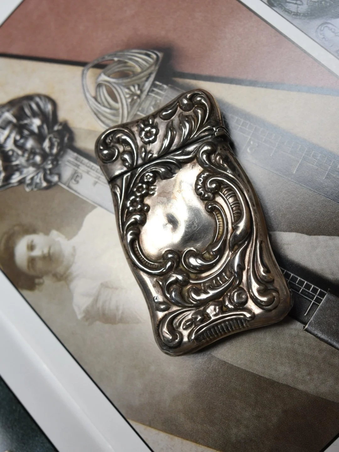 Antique Art Nouveau era sterling silver repoussé floral match safe