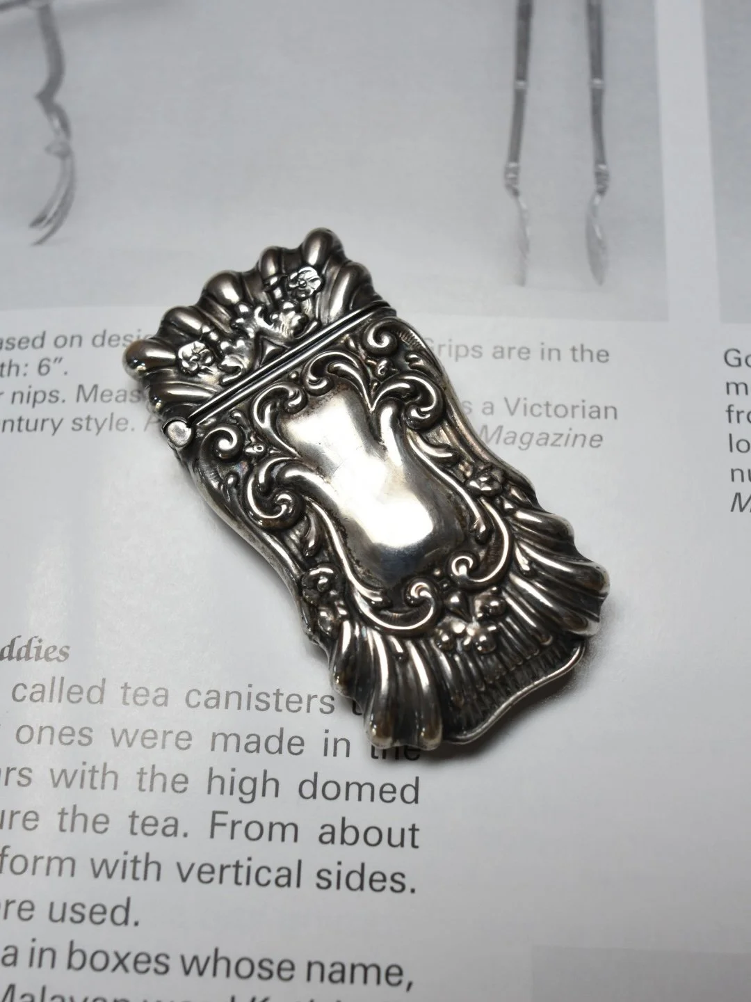 Antique Art Nouveau era sterling silver repoussé scalloped match safe