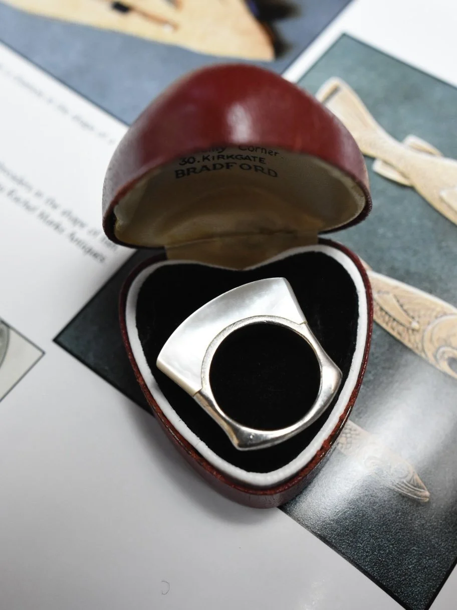 Modernist sterling silver mother of pearl sculptural ring