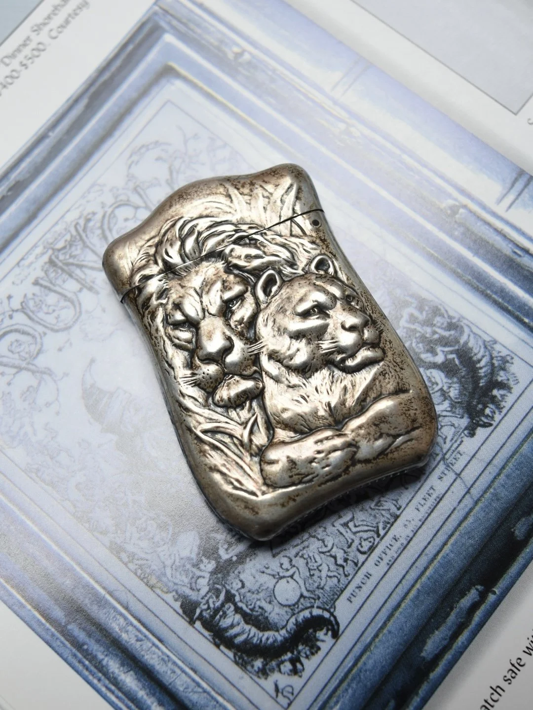 Antique Art Nouveau lion and lioness sterling silver repoussé match safe