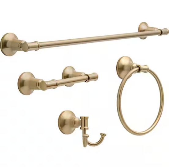 Set of four gold-colored bathroom hardware items including a towel bar, a towel rail, a toilet paper holder, and a ring holder.