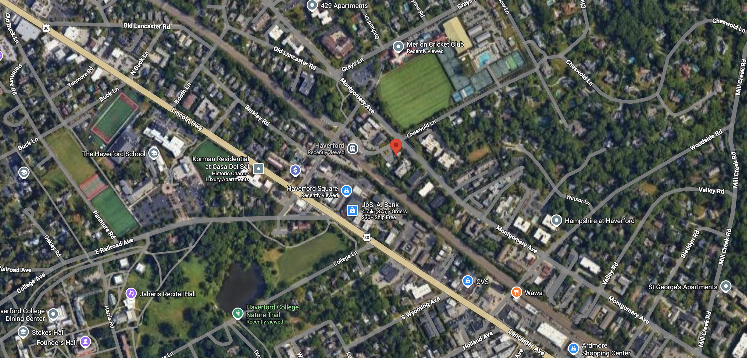 Satellite map of Haverford, showcasing roads, residential areas, schools, parks, and nearby amenities including Haverford College and recreational fields.