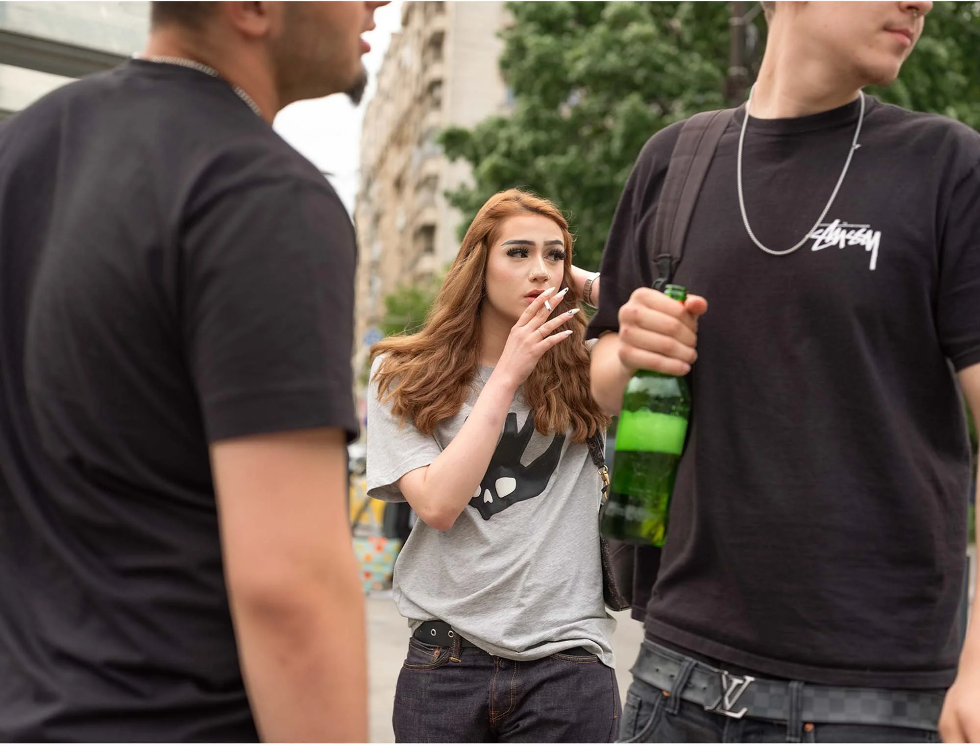 Documentary photo by Roman Bezjak from the series "Bucharest Tram," showing commuters waiting at Piața Unirii, girl smoking