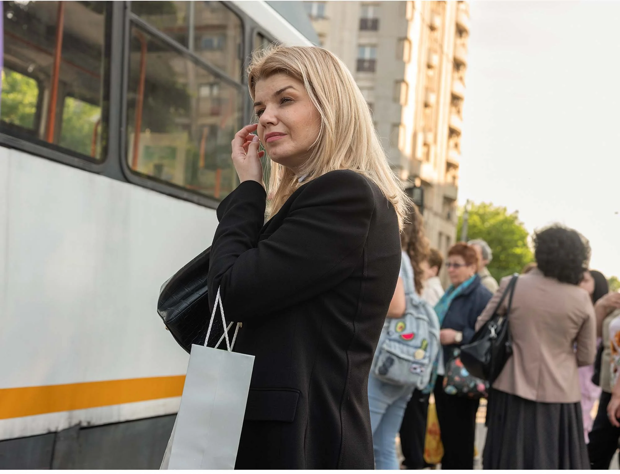 Passengers waiting for a tram at Piata Unirii station in Bucharest