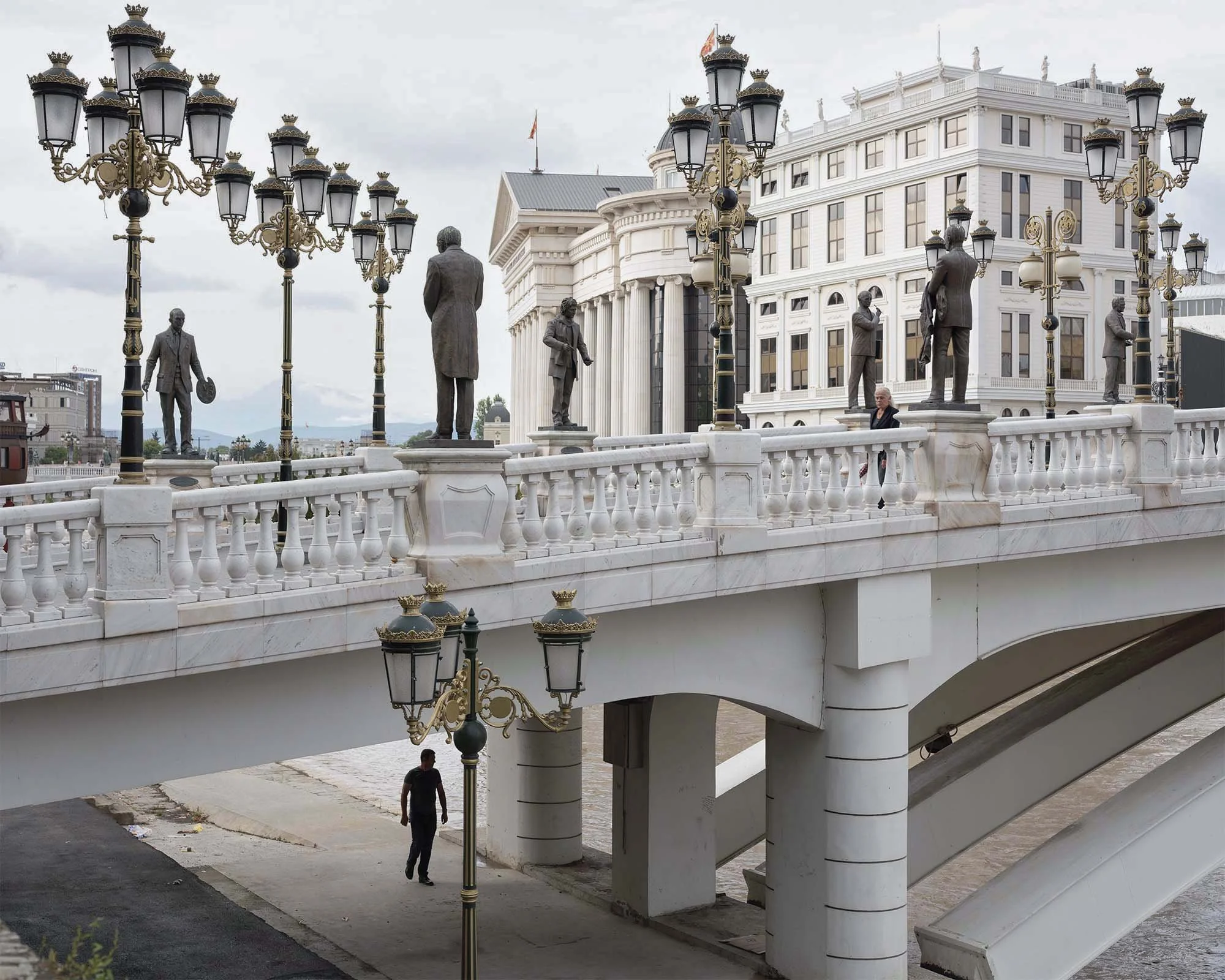 Documentary photography by Roman Bezjak from the Skopje series: The post-1963 modernist reconstruction reshaped by the neoclassical Skopje 2014 project, Art Bridge and  Archaeological Museum of North Macedonia, Vardar River