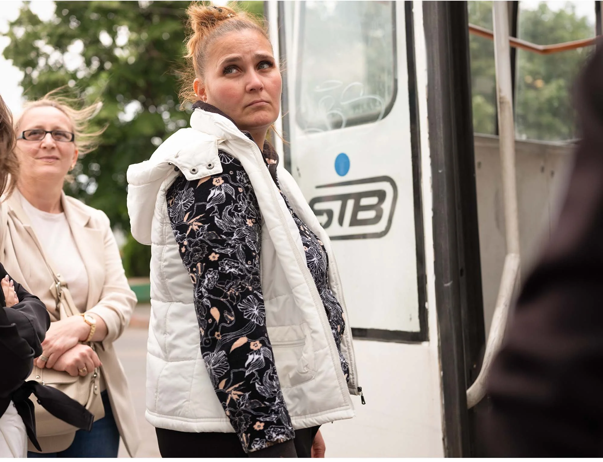 Documentary photo by Roman Bezjak from the series "Bucharest Tram," showing commuters waiting at Piața Unirii