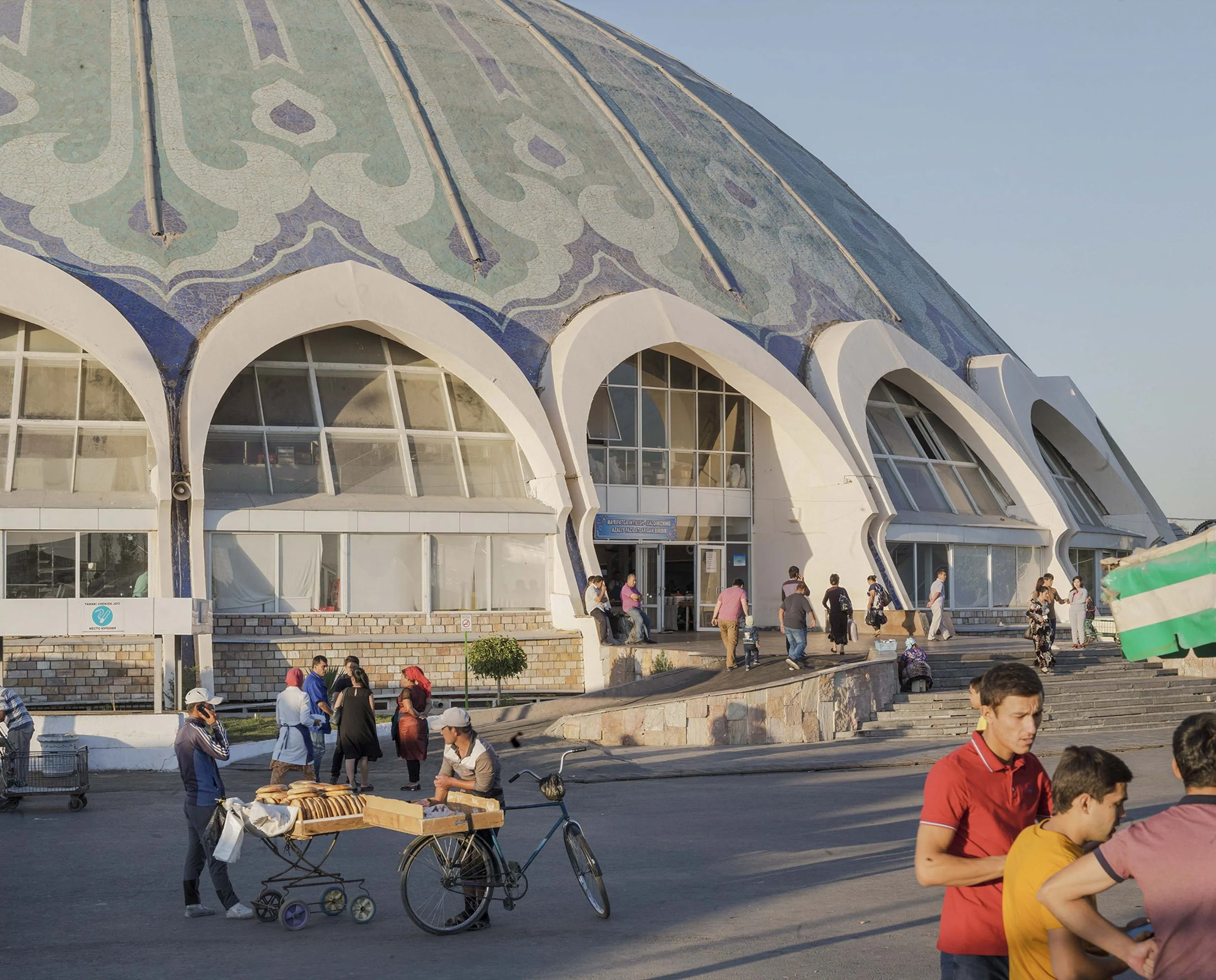 Documentary photo by Roman Bezjak, from the series Tashkent. Soviet-era residential architecture combining modernist construction with local Uzbek traditions after the 1966 earthquake, iconic modernist Chorsu Bazaar market hall in Tashkent, Uzbekista