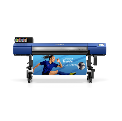 Large-format Roland printer printing a vibrant blue advertisement featuring a woman playing soccer.