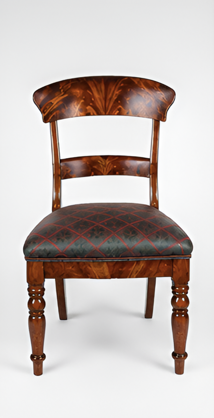 Antique wooden chair with curved backrest, upholstered seat, and turned legs, set against a plain white background.