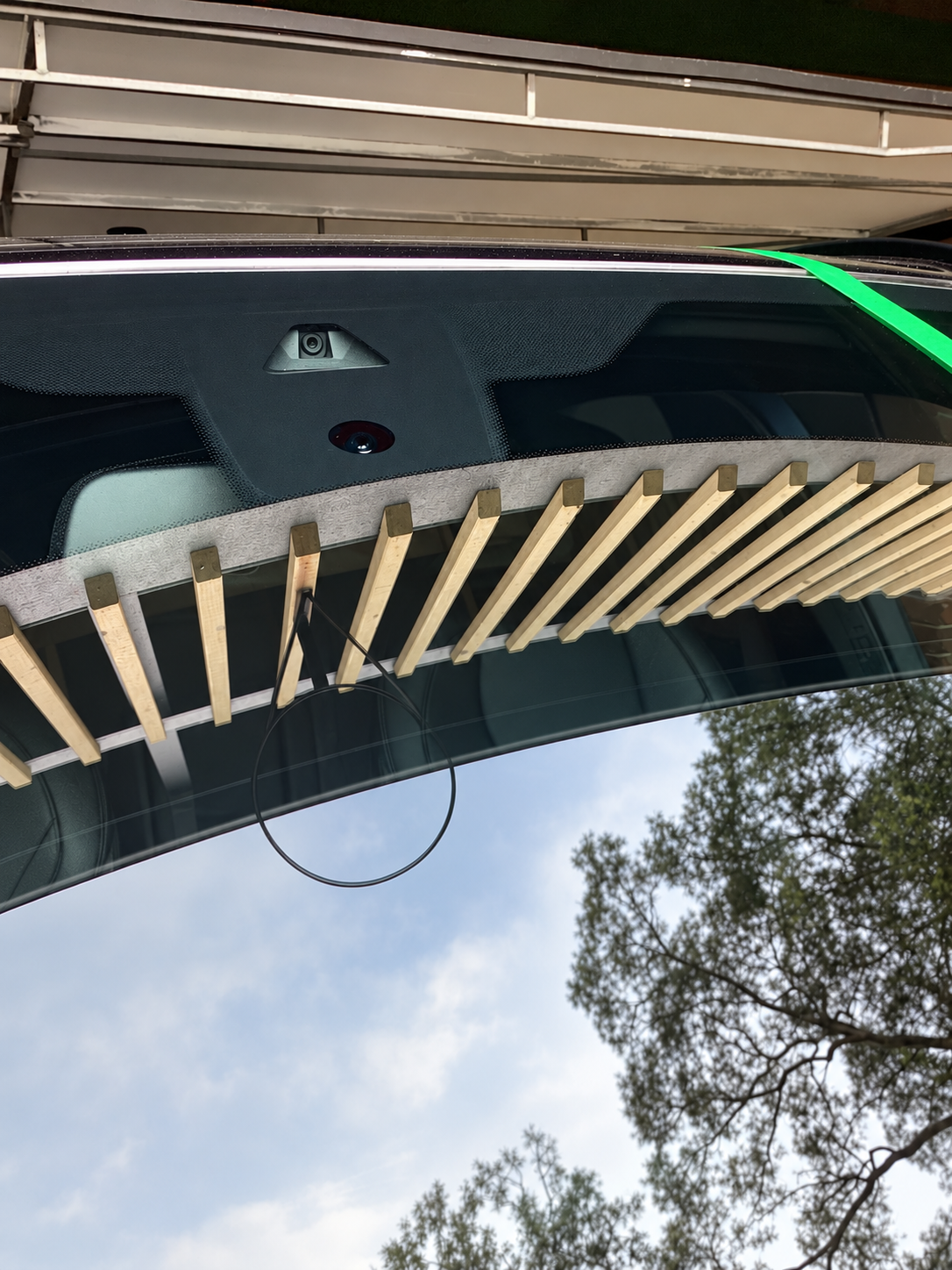clear windscreen showing an adas camera sensor