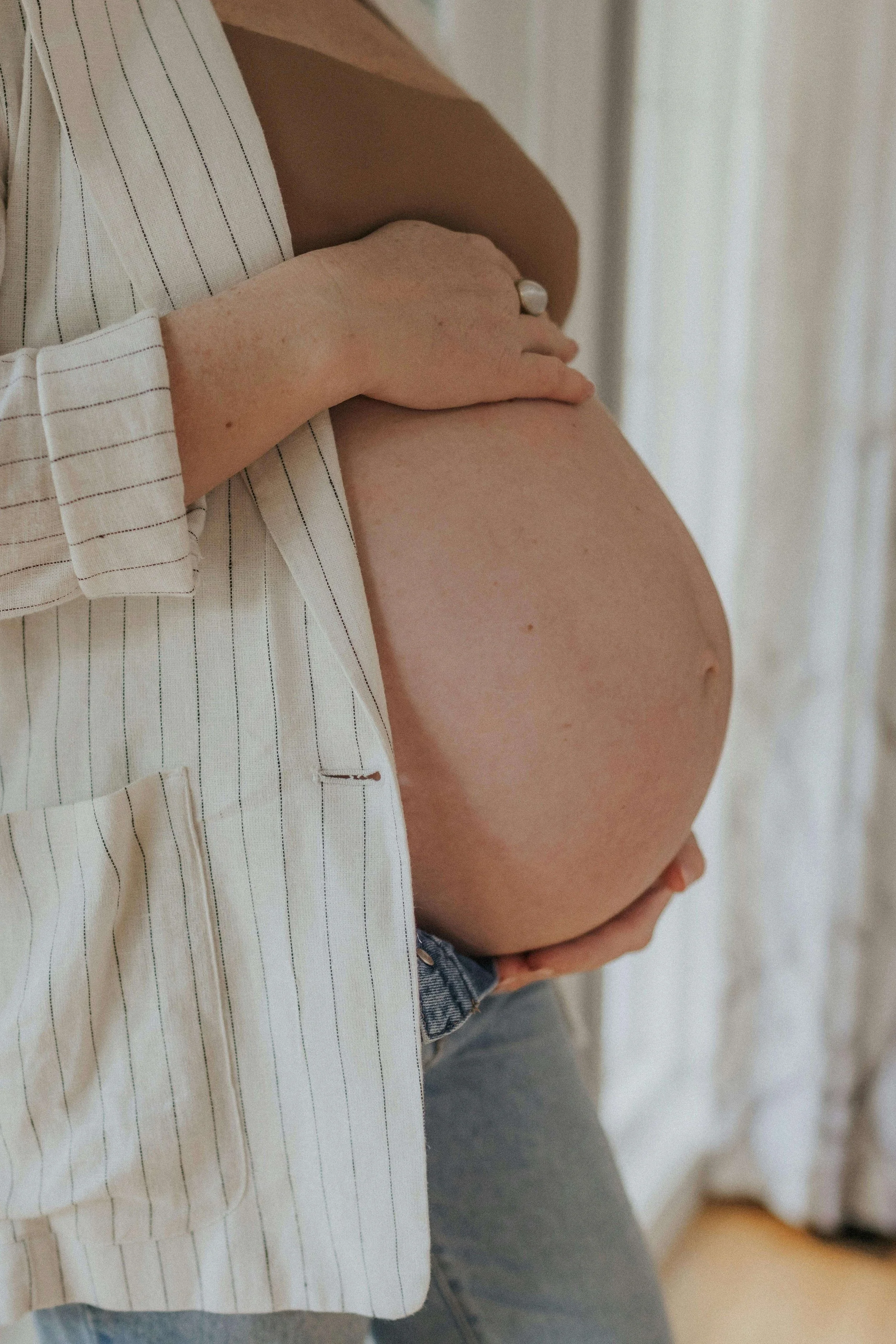 pregnant belly holding professional photoshoot massachusetts
