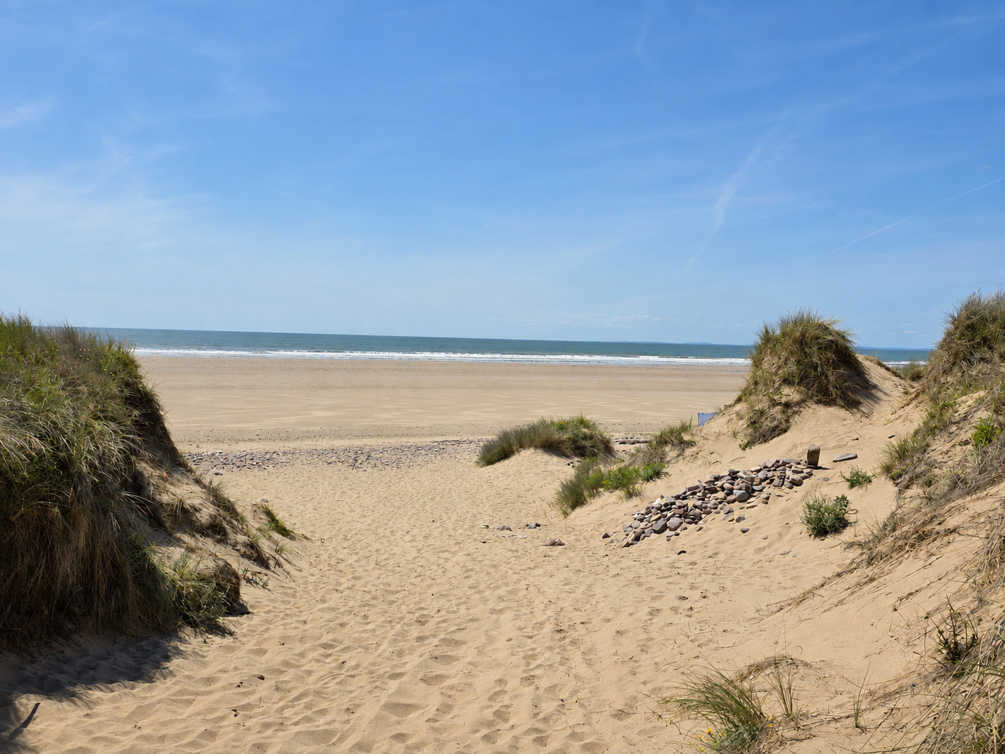 The beach path through the dunes leading towards the sea representing the journey to a longer, well-planned life.