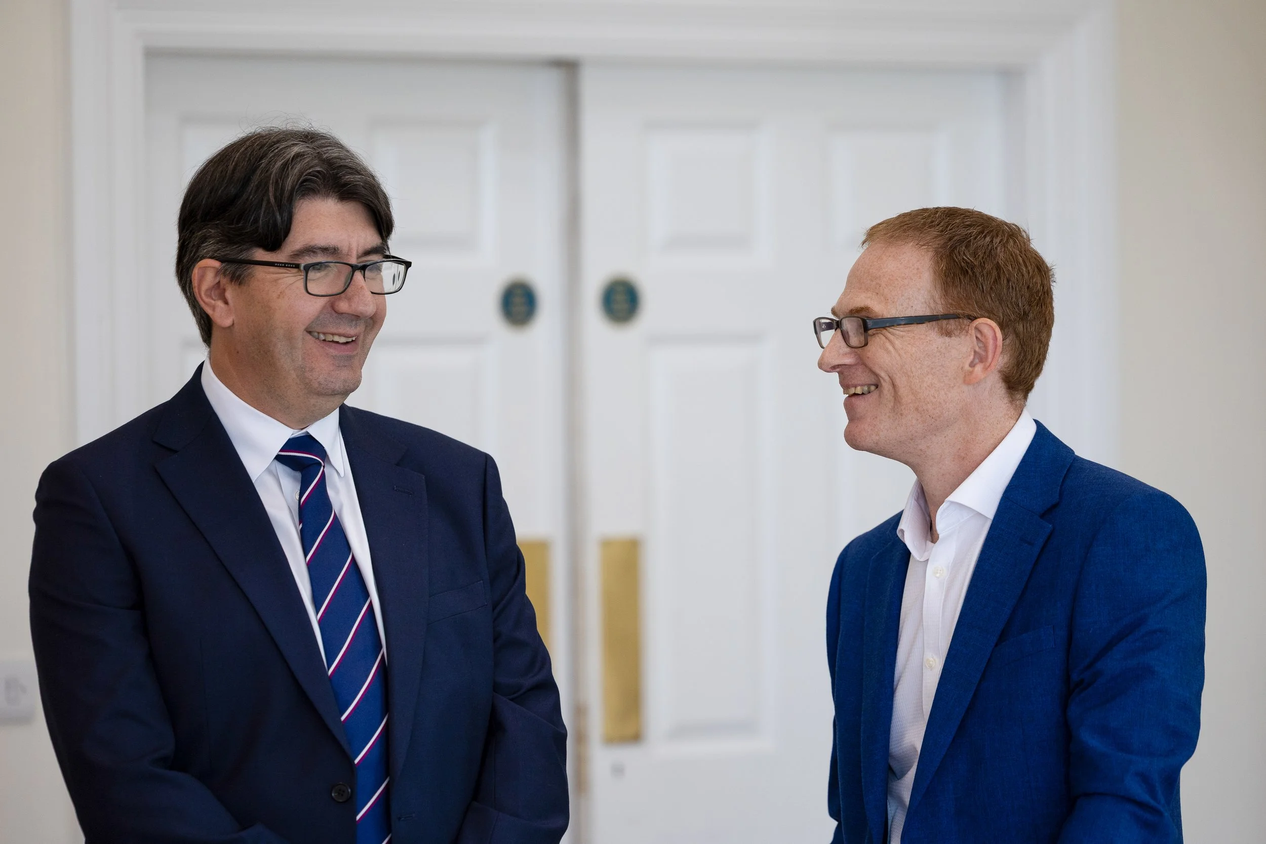 Scott Gallacher speaking with a colleague at Rowley Turton.