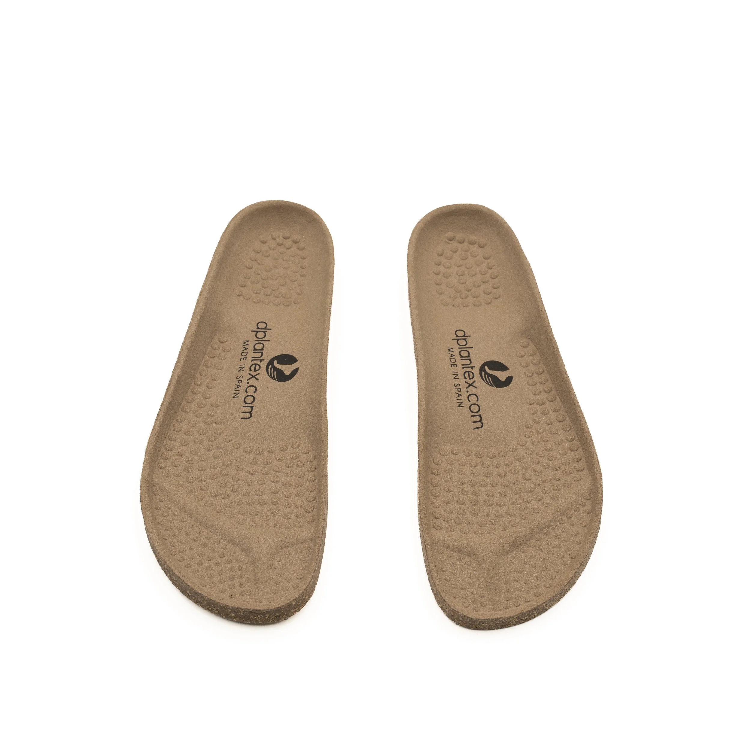 Zapatos de suela de color beige con textura en la parte inferior, marcas de la marca 'plantarax' y origen en España.