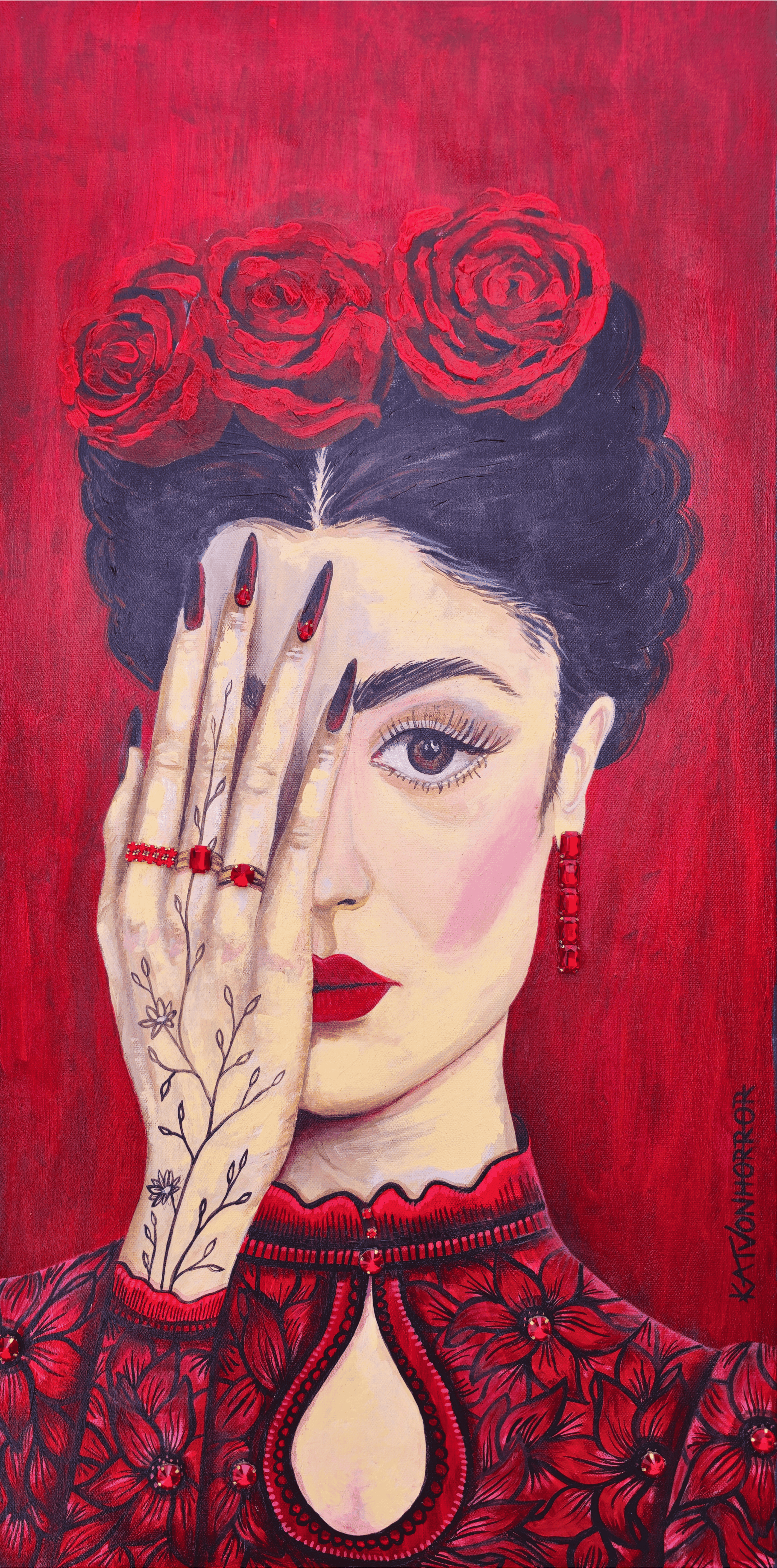 A portrait of a woman with dark hair, makeup, and red lips, wearing red jewelry and a red floral-patterned dress, with a red background. She has a hand with black painted nails and tattoos covering the arm, partially covering one eye, and a crown of red roses on her head.