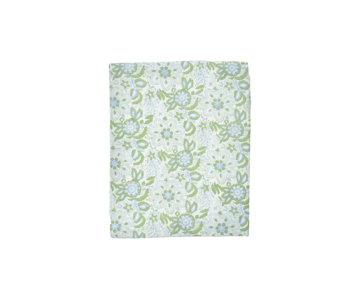 A fabric with a floral pattern in light green and white colors.