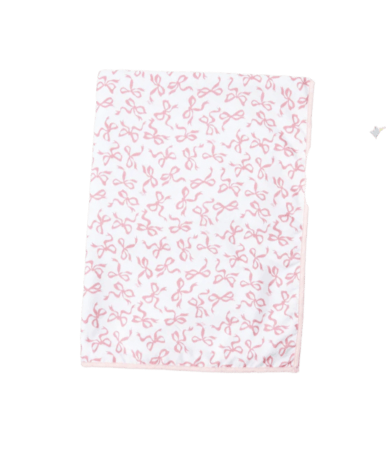 A white fabric with a pink pattern of small bows.