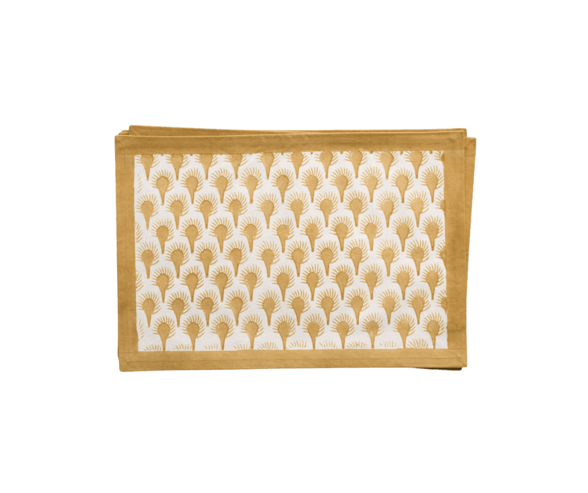 A stack of beige paper napkins with a white patterned strip featuring stylized wheat sheaves.