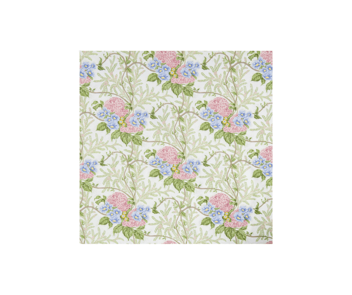 A fabric with a floral pattern featuring pink and blue flowers on green vines and leaves on a white background.