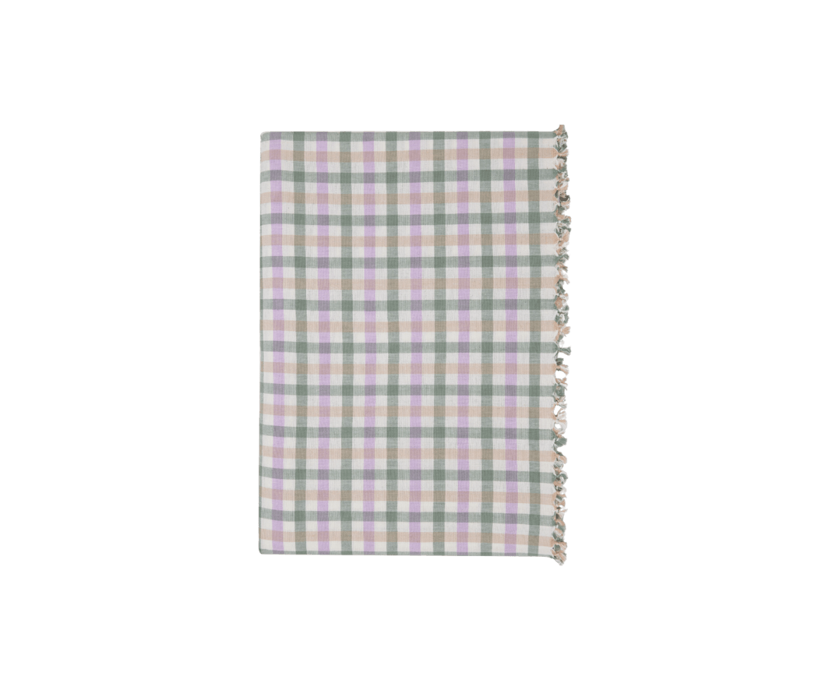 A folded checkered cloth with pastel green, purple, pink, and beige squares