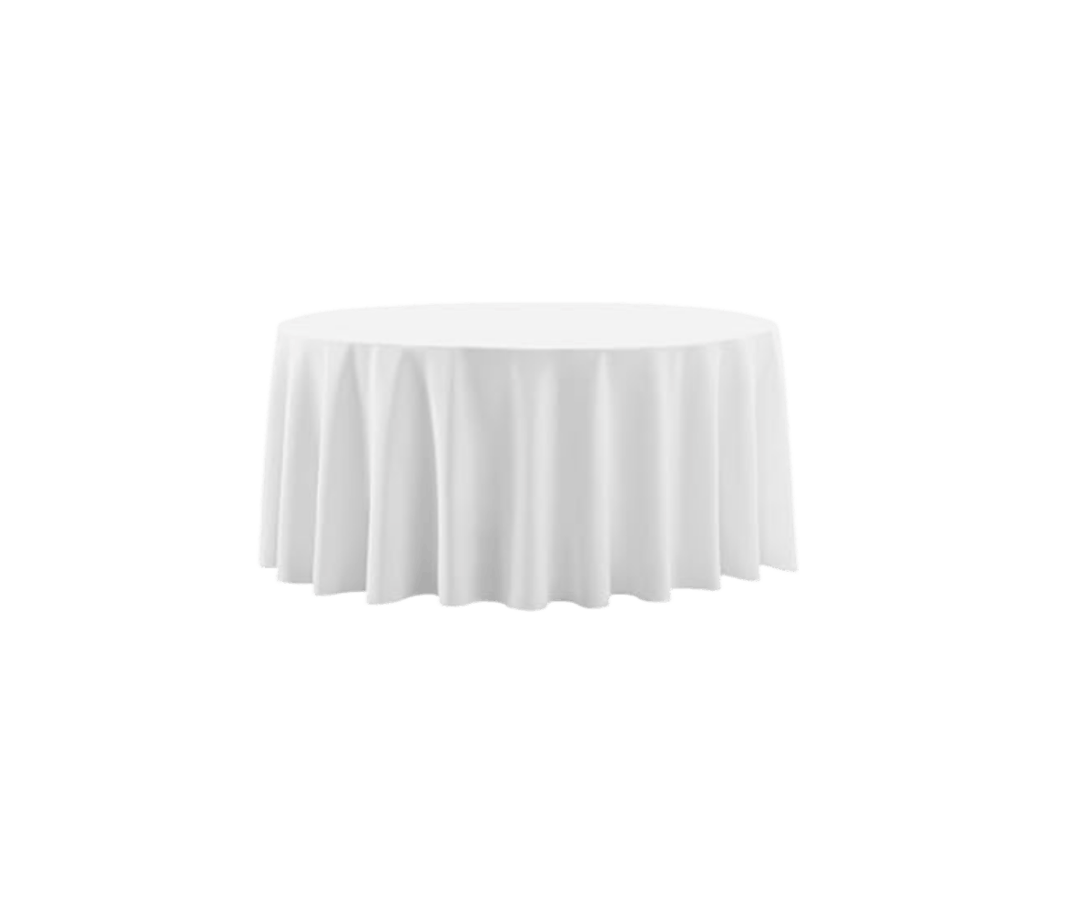 Round table covered with a white tablecloth.