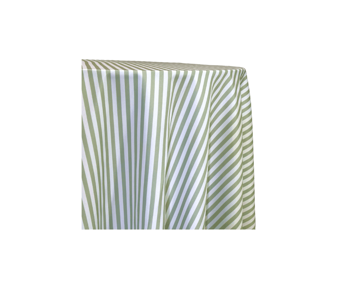 Green and white diagonal striped fabric draped over a rectangular surface.