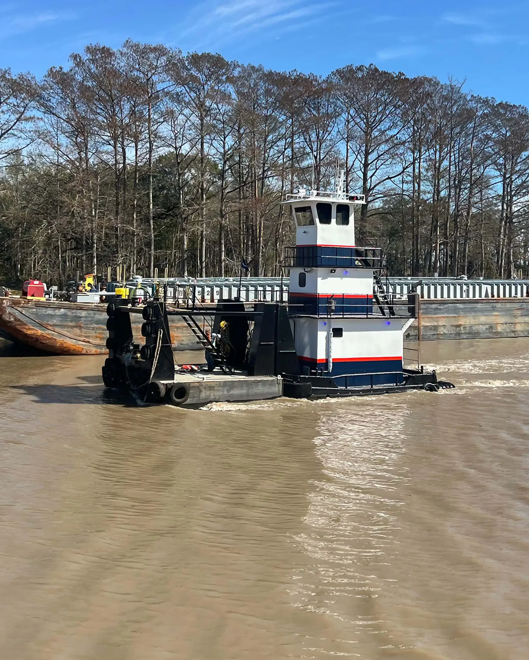 MV Dixie truckable pushboat underway on a Louisiana waterway