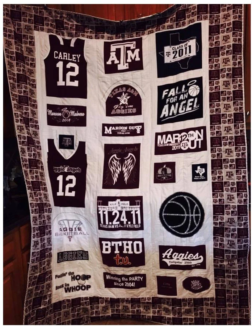 A quilt made from various Texas A&M University themed fabric patches, including sports jerseys, logos, slogans, and photos, celebrating the school's athletic and academic achievements.